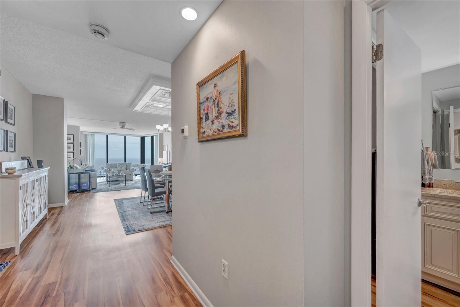 entrance, half bath right, kitchen left side