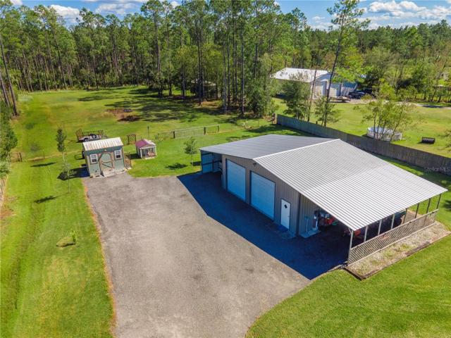 Metal building with lean to on each side