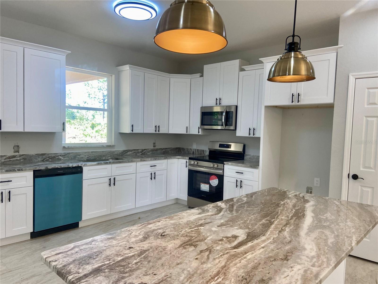 Kitchen Island with dropped lighting.