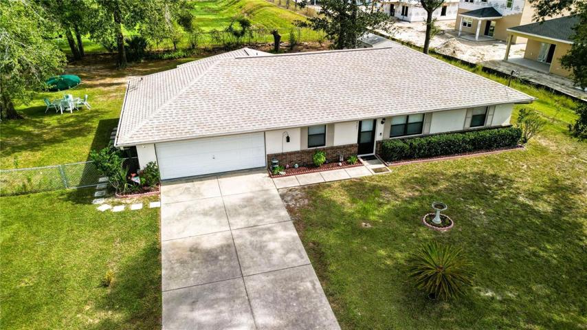 with .43 acre fenced lot.