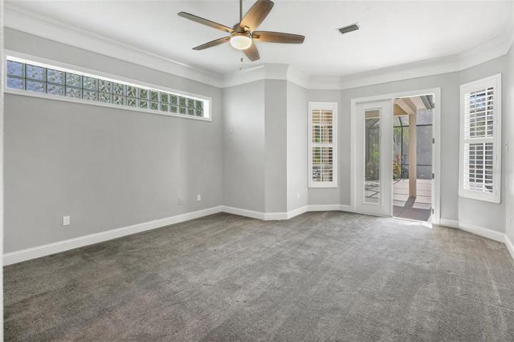 owner's suite w/high impact French doors