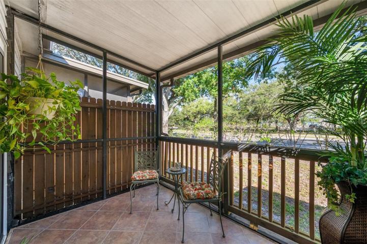 Relaxing screened enclosed patio