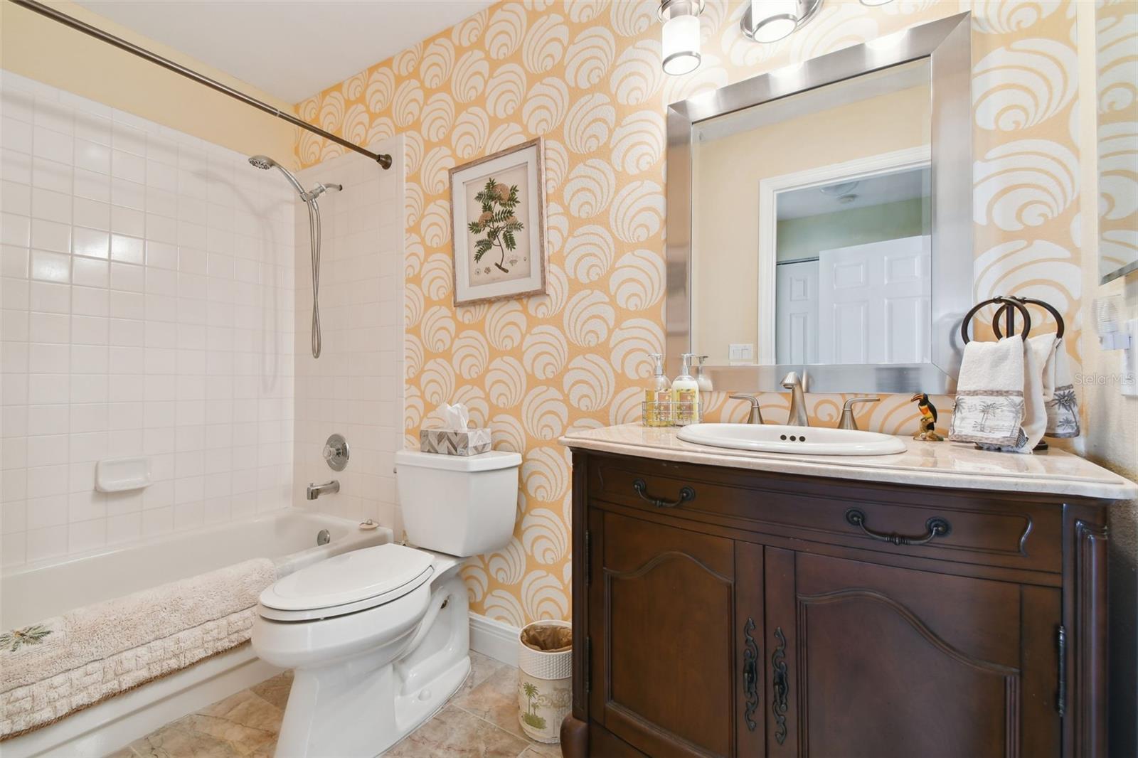 Gust Bathroom with a tub/shower combo