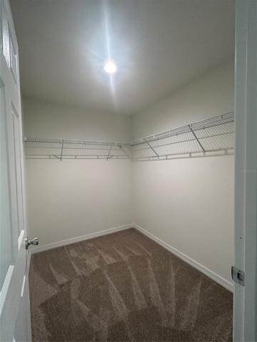 MAIN WALK IN CLOSET