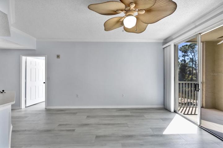 Living Area Sliders to Balcony and door to Master Bedroom