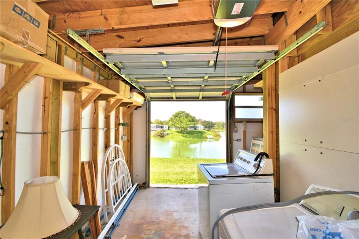 Golf cart garage / workshop overlooking the lake