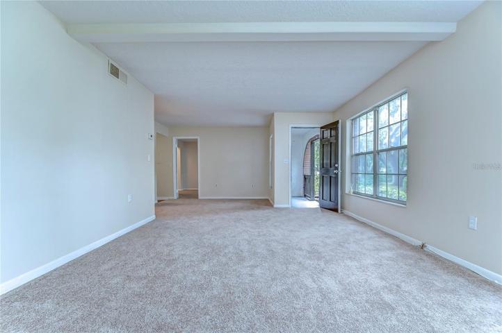 Back Entry Door Open (covered porch outside - access to parking area)