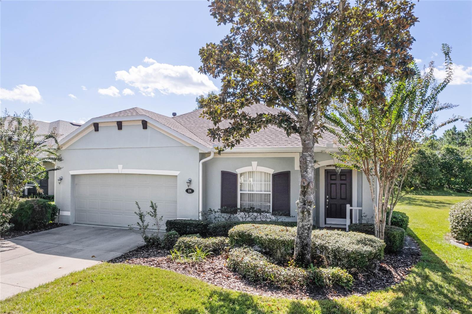 Exterior front of home showing pie-shaped homesite