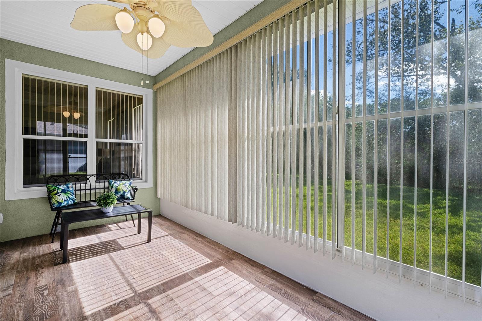 Enclosed covered patio w/ luxury vinyl flooring