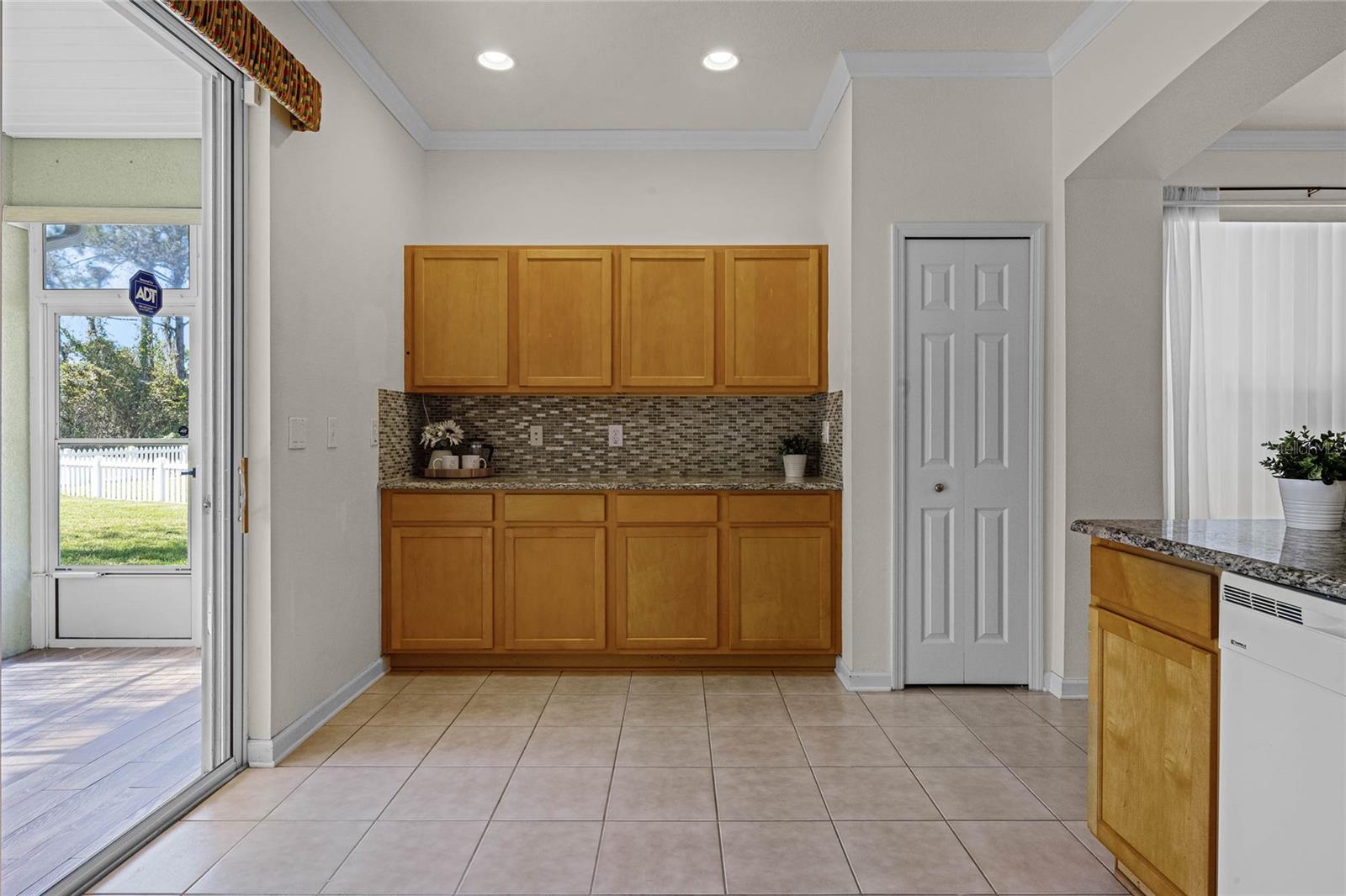 Extra storage cabinetry or coffee bar in Kitchen area