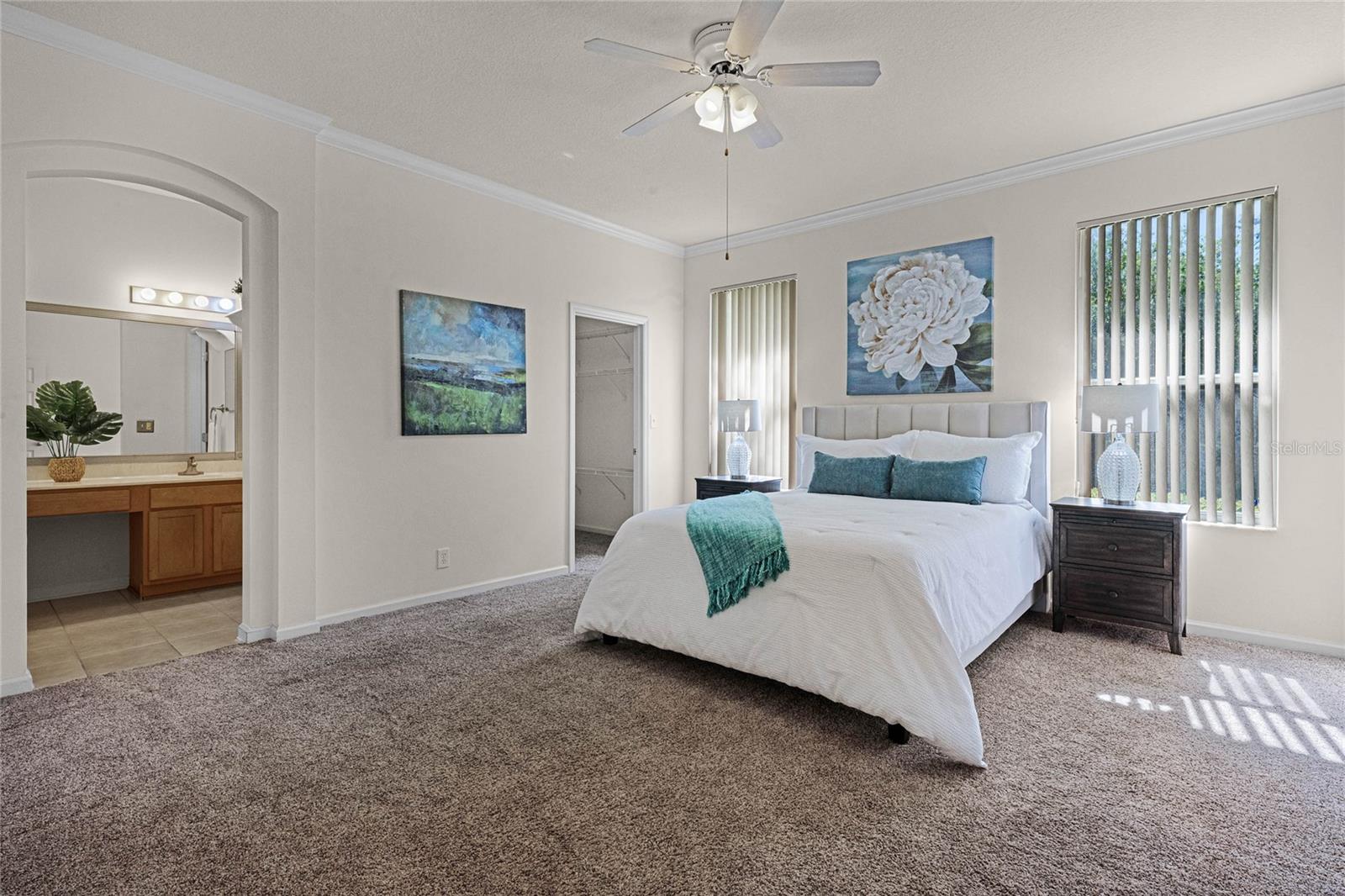 14'6" x 15' Master Bedroom w/ crown molding & ceiling fan