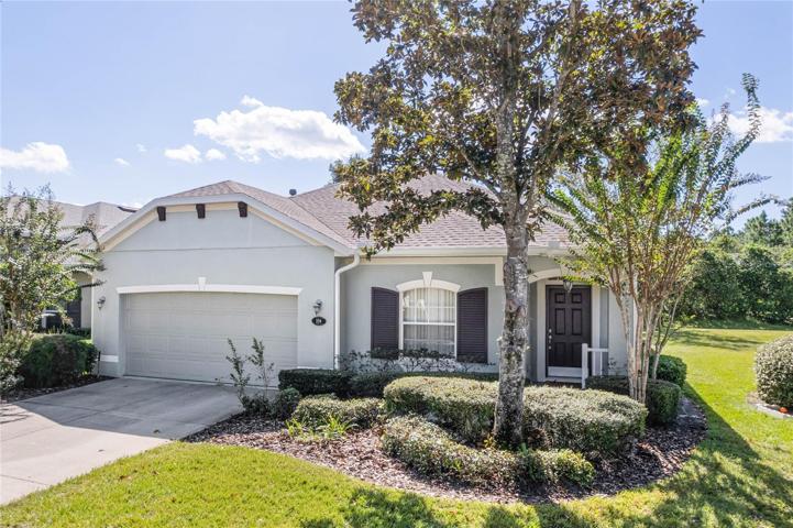 Exterior front of home showing pie-shaped homesite