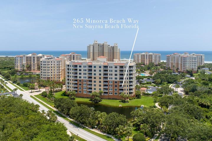 Condo Complex Aerial with Arrow Showing Unit
