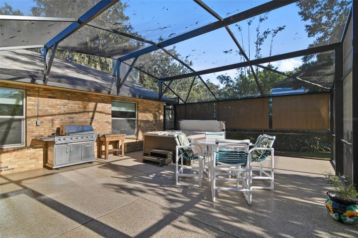 In addition there is a 28x25 SCREENED PATIO with Pebble Tech flooring for the ideal outdoor experience, there is even a HOT SPRINGS SPA with music to spend your evenings relaxing under the stars!