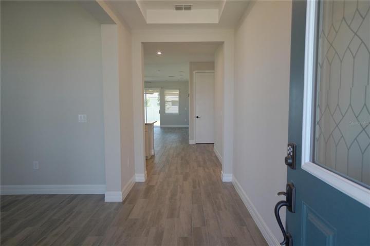 Wood look tile throughout the main areas