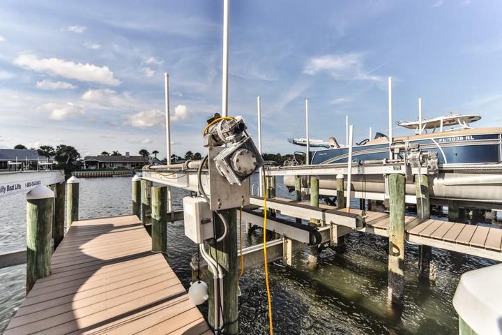 Boat lift includes power and water