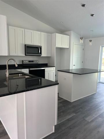 All wood cabinets with granite tops