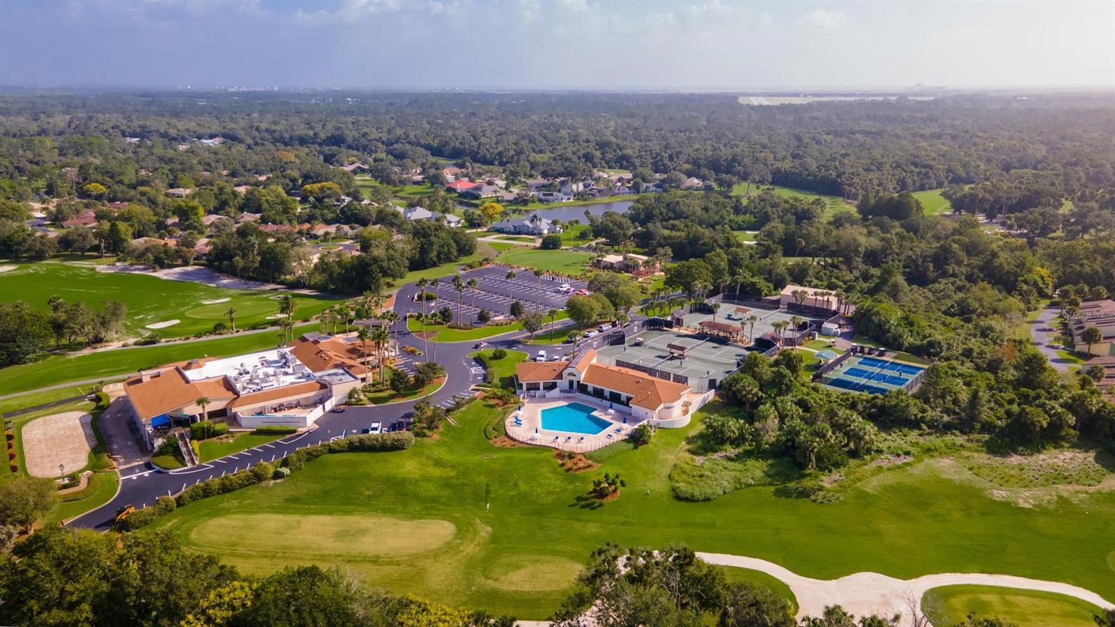 Sugar Mill Country Club, pro shop, fitness center, pool, tennis & pickleball courts.