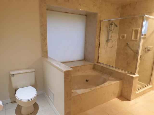 Jetted tub & step in shower in master bath