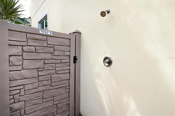 Outdoor shower is perfect for washing off after the beach!