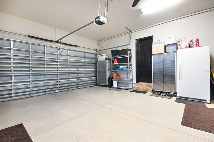 Oversized 2-car garage is extra deep and has high ceilings.