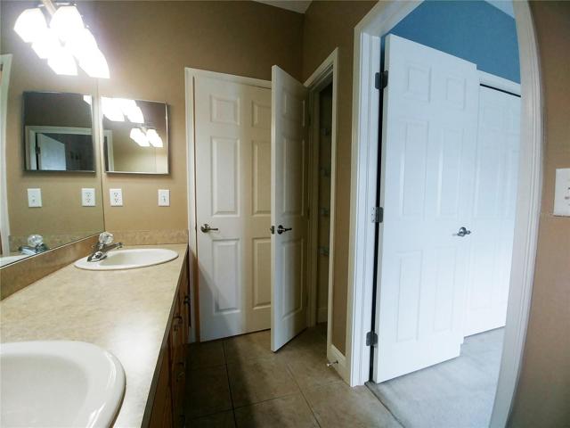 Dual Sinks and Linen Closet