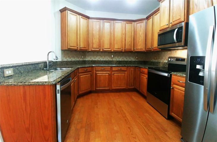 Large Kitchen with New Stainless Steel Appl