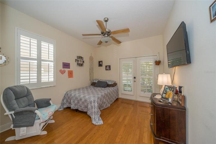 Downstairs Bd with French Doors to Lanai