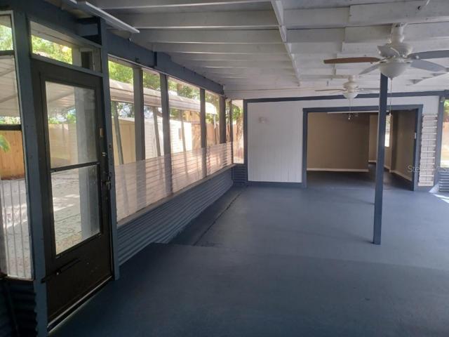 HUGE porch!  No shelves & bright paint