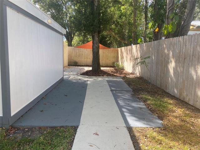 sidewalk to back of property