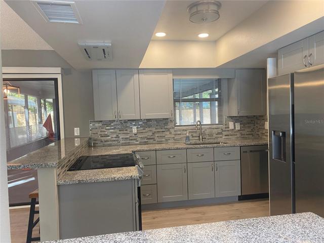 brand new kitchen w/ cabinets & granite countertops
