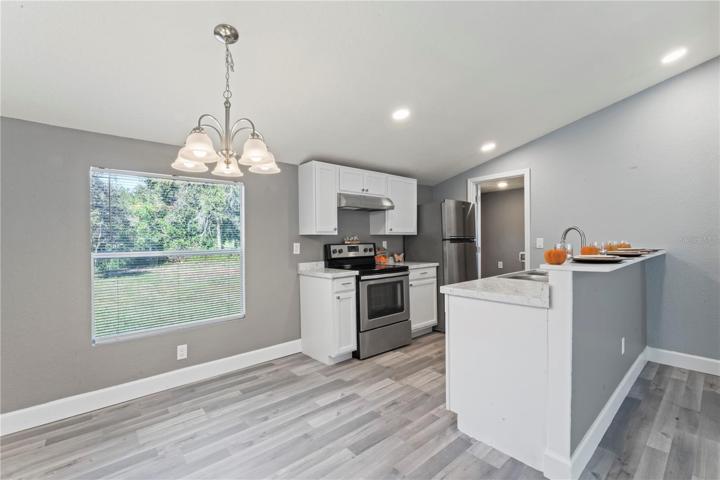 Dining room and kitchen.