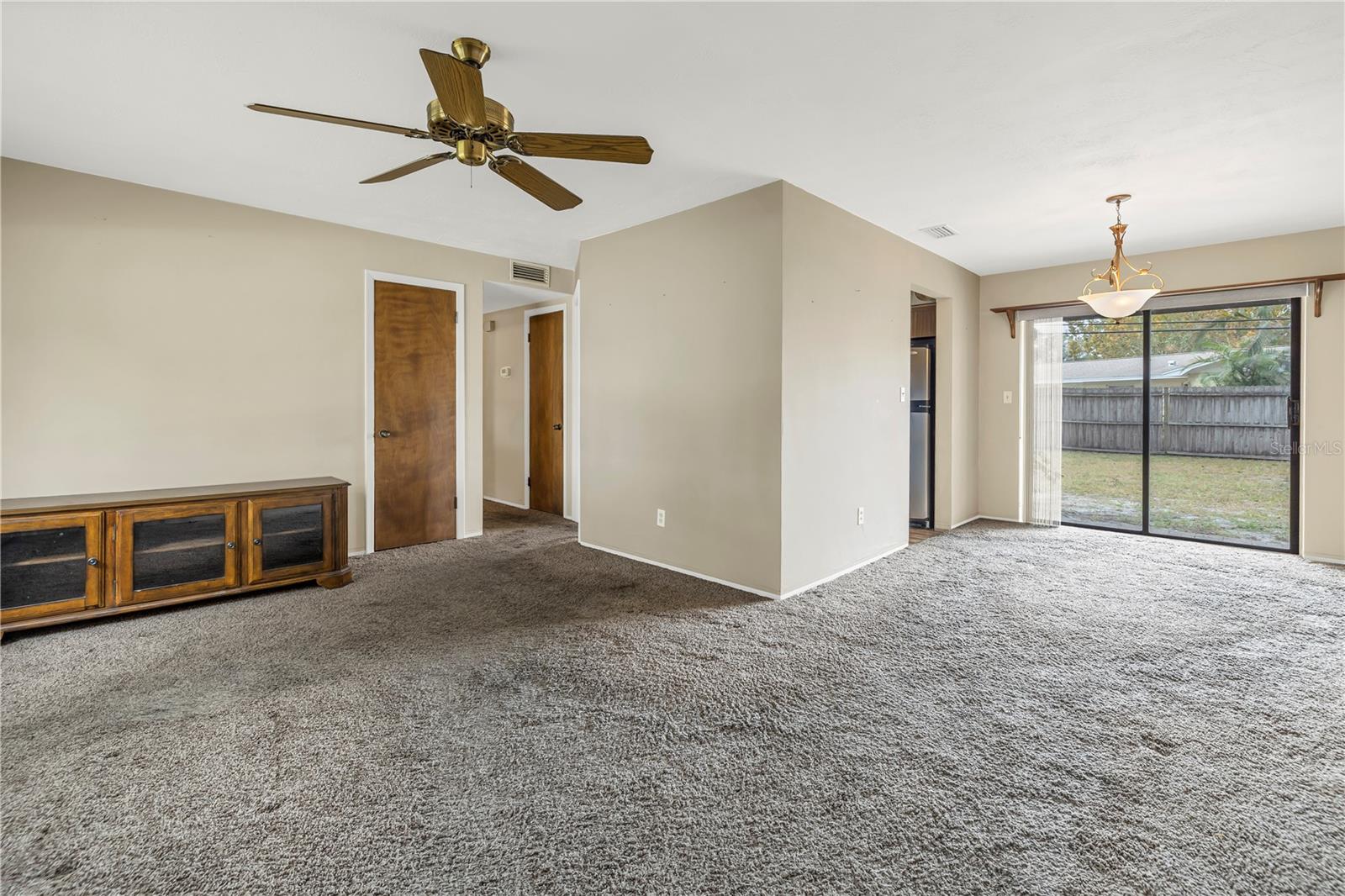 Nice L-shape dining-living space and easy to remove this wall enclosing the kitchen for an open living space