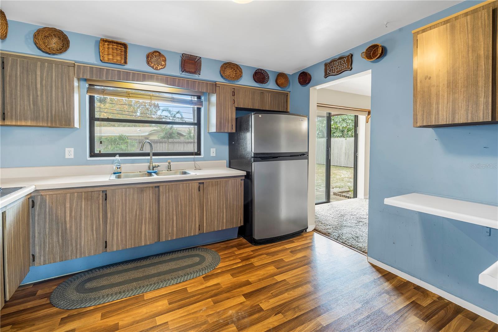 Plenty of storage and great condition on all appliances along with a great view of the backyard from the sink