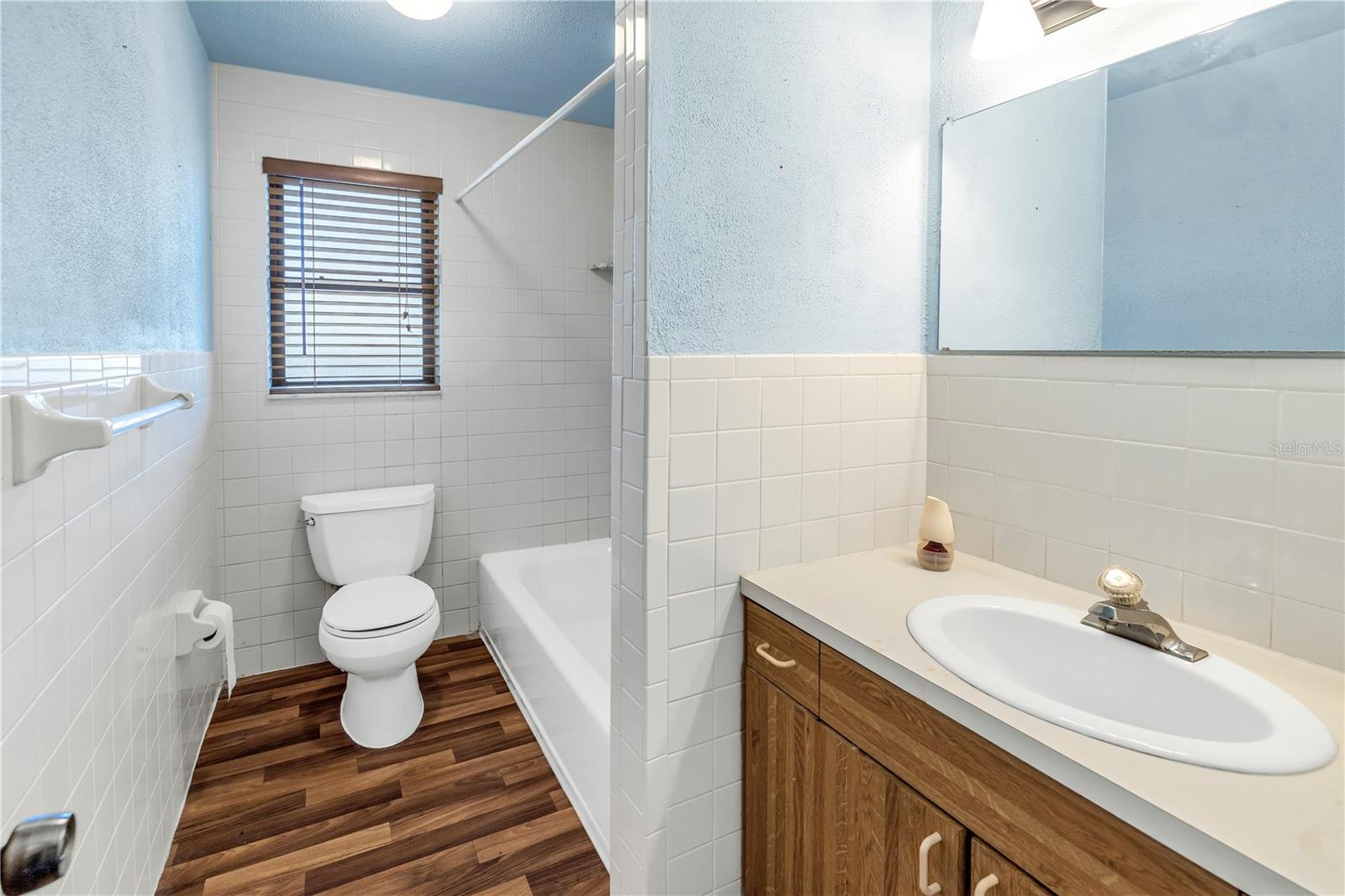 Bathroom with updated laminate flooring