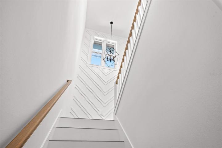 Stairs from entry to main living area
