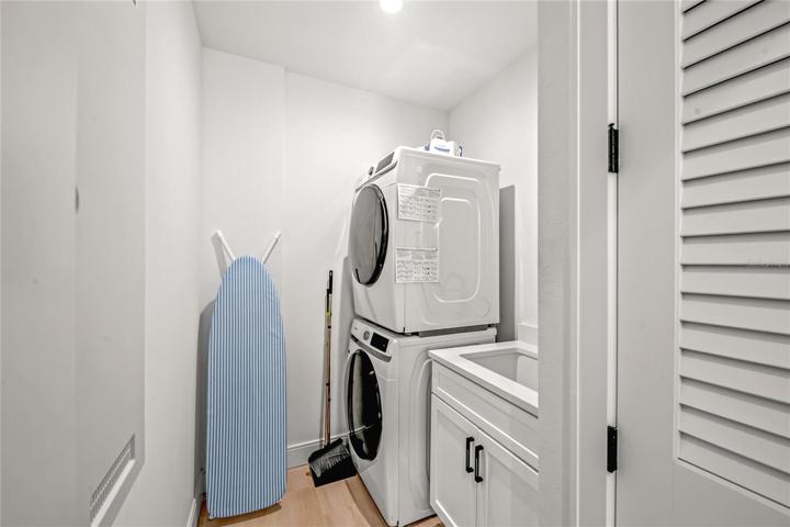 Full sized washer and dryer with laundry sink