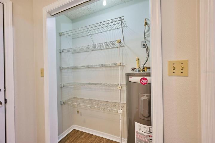 Indoor laundry provides pantry space and/or storage