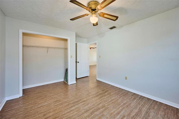 Vinyl flooring in the guest bedroom as well