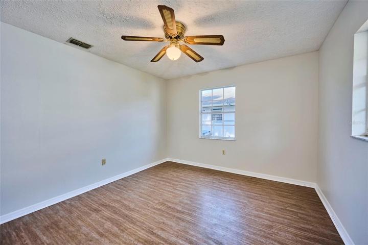 Guest bedroom is on the opposite side of the home