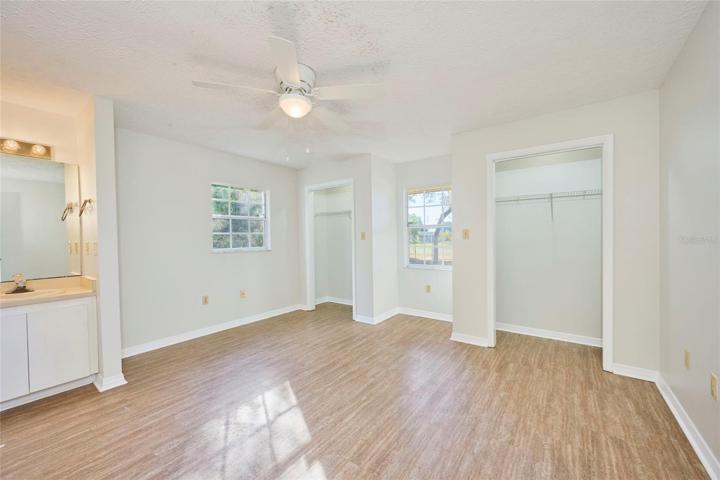 Master suite features dual closets