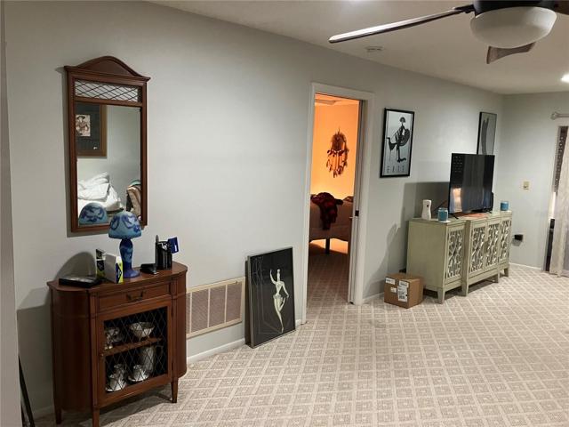 Living Room with entry to Owner's Suite