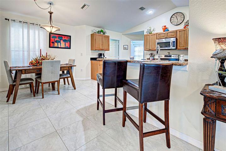 Kitchen, dining room and bar area