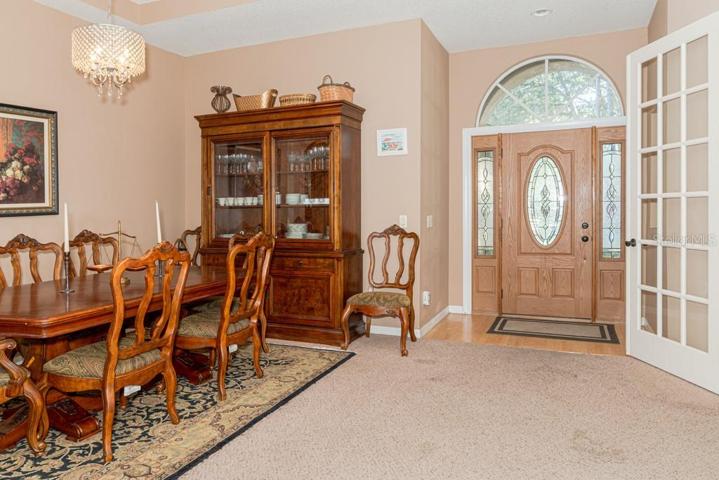Foyer & Dining Room.  Office to right in pic