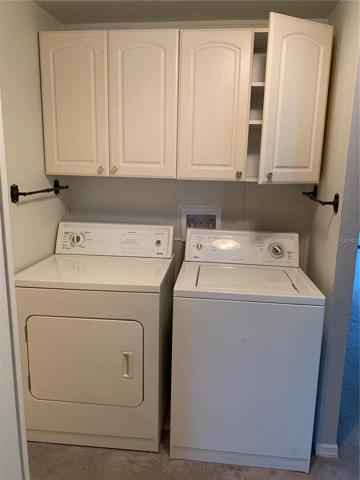 Inside washer dryer with storage