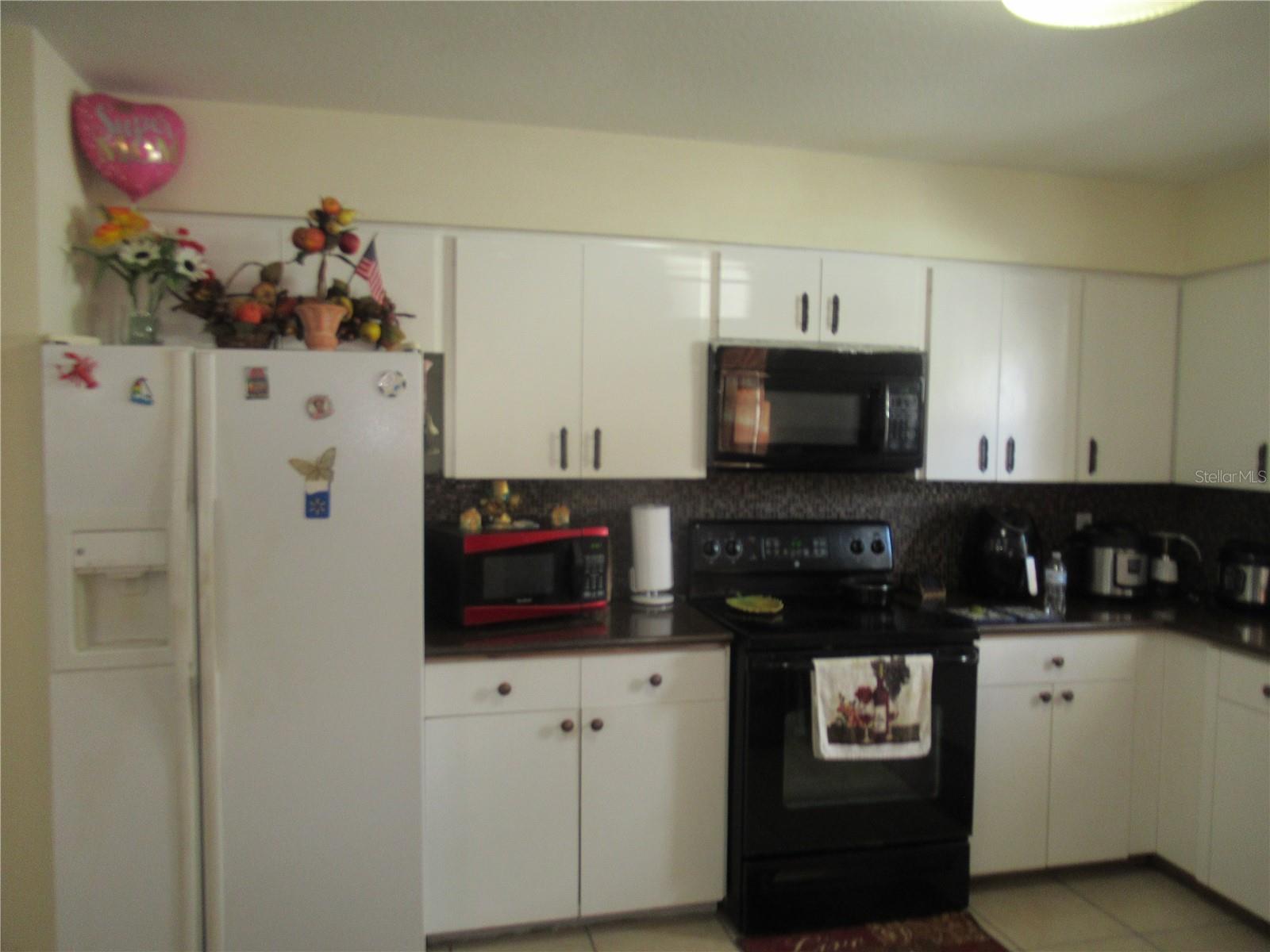 KITCHEN VIEW FROM FRONT DOOR ENTRANCE