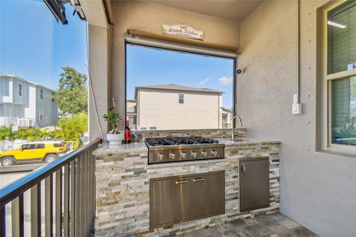 outdoor kitchen with sink