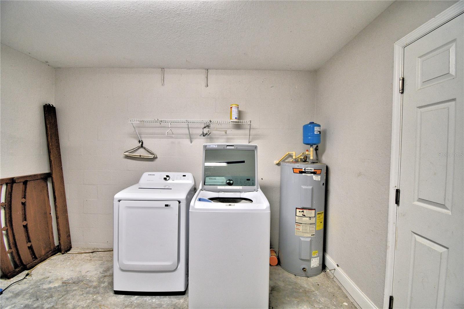 Laundry room in one car garage