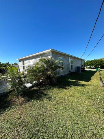 Left side of the house - view from backyard to the front.