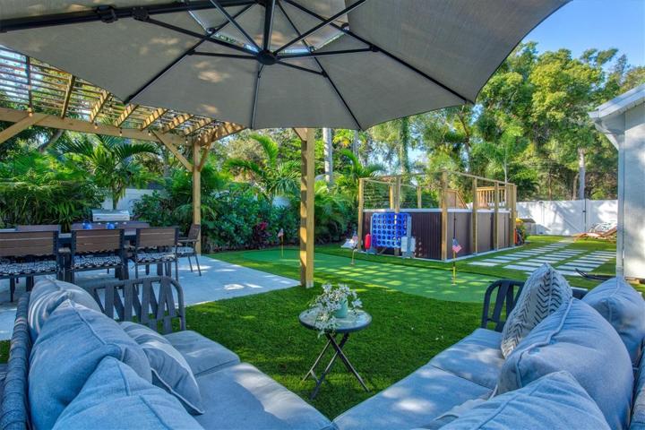 Fully fenced, artificial turf and Putt Putt